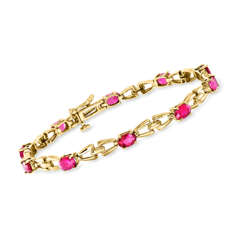 Vintage ruby link bracelet in 14kt yellow gold with pink-red oval stones