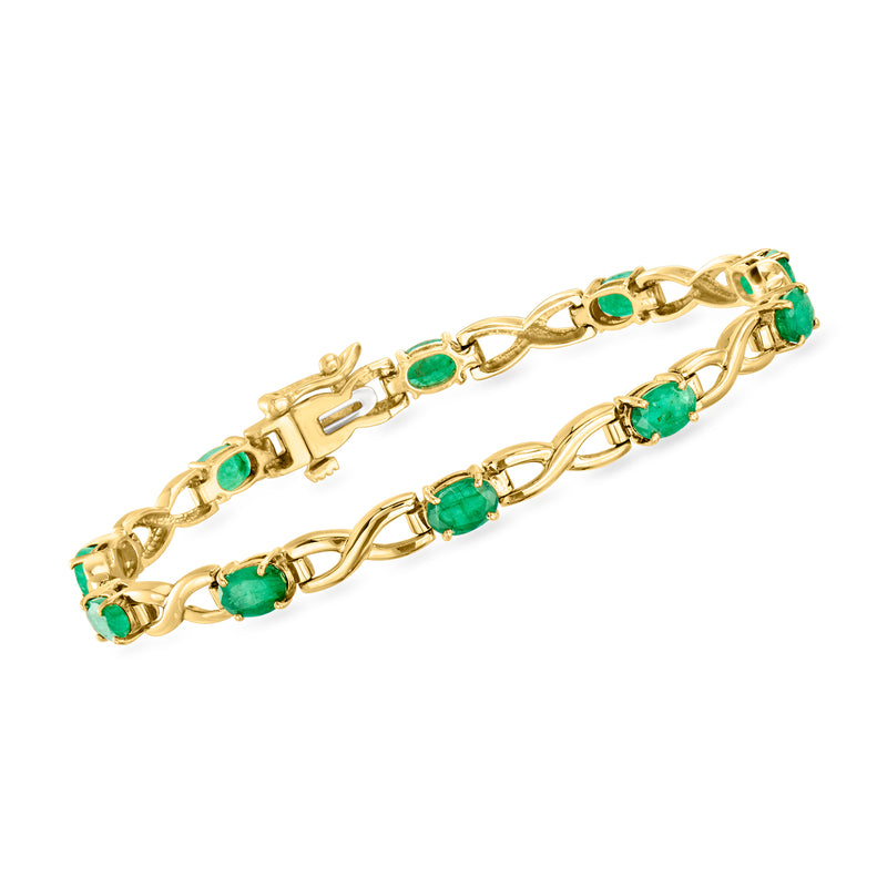 Vintage yellow gold link bracelet with emerald green gemstones