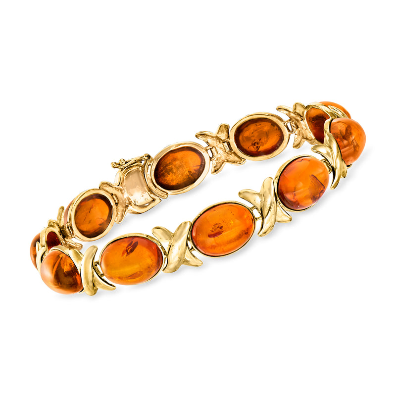 Vintage amber X-link bracelet in 14k yellow gold with oval orange amber stones