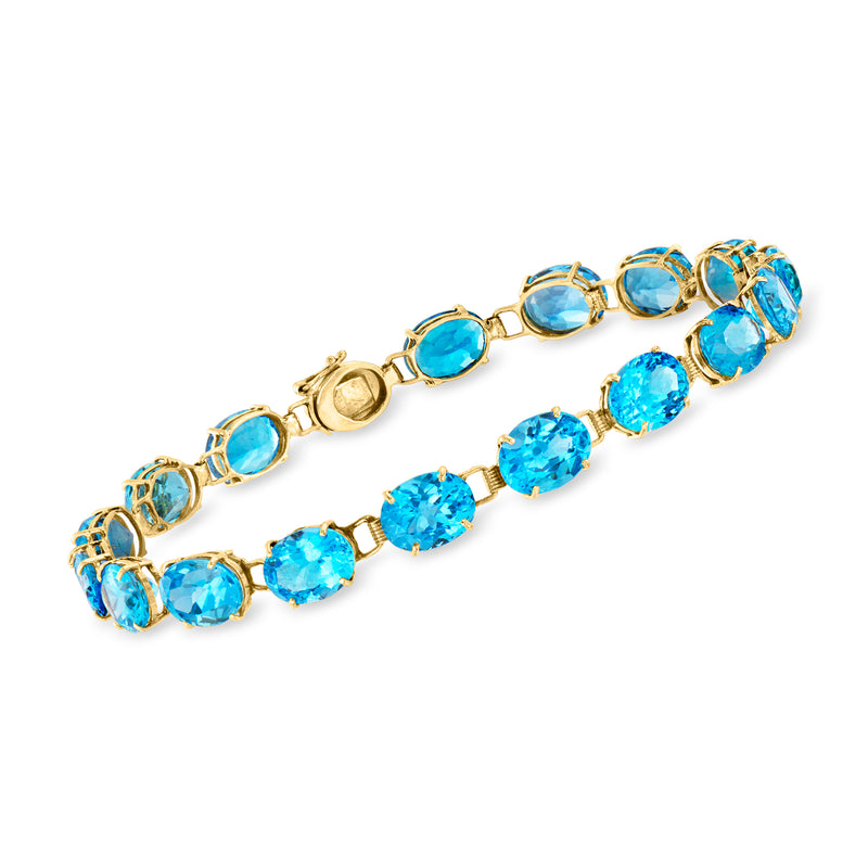 14kt yellow gold bracelet with oval Swiss blue topaz gemstones, link setting