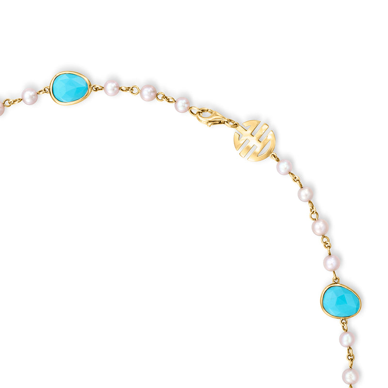 Rose gold cultured pearl necklace with turquoise blue oval links and toggle clasp