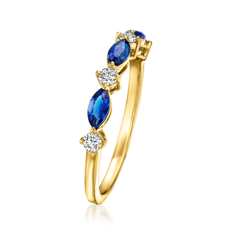 Gold over sterling ring featuring oval blue sapphire stones with round diamond details
