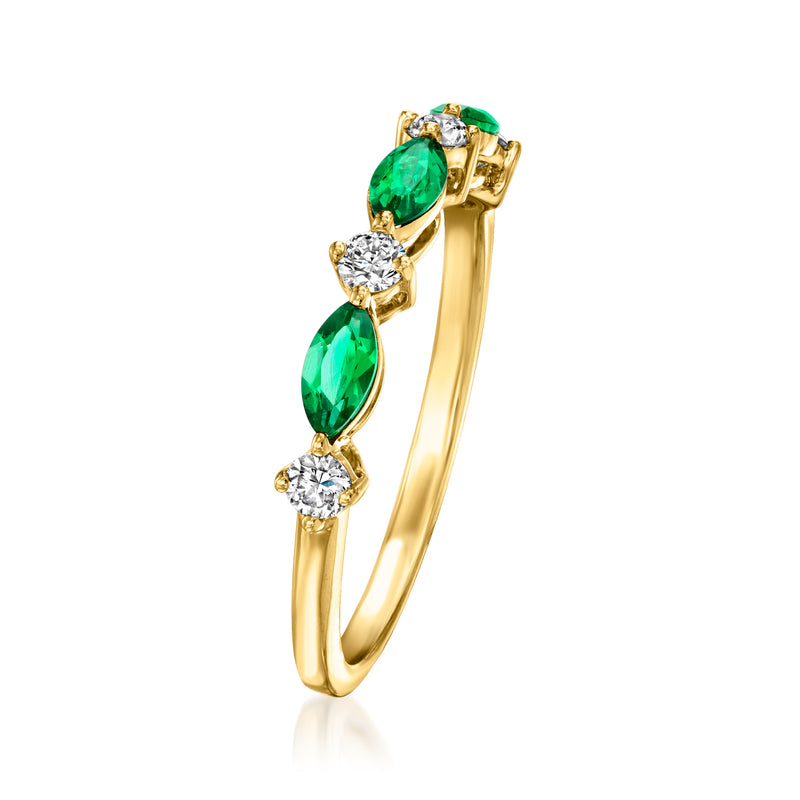Gold vermeil ring side view with emerald-green ovals and round diamond halos