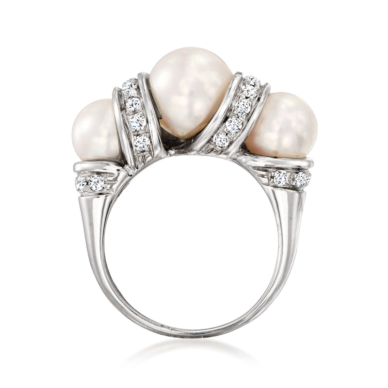 Cultured pearl and diamond ring in polished white gold, central pearl with diamond halo