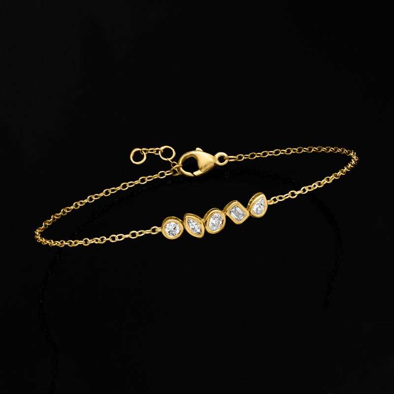 Gold bracelet with five bezel-set diamonds and spring-ring clasp, linear design