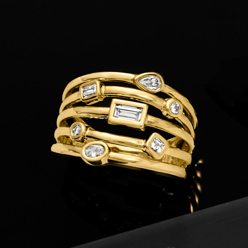 Gold multi-row ring with bezel-set baguette and round diamonds