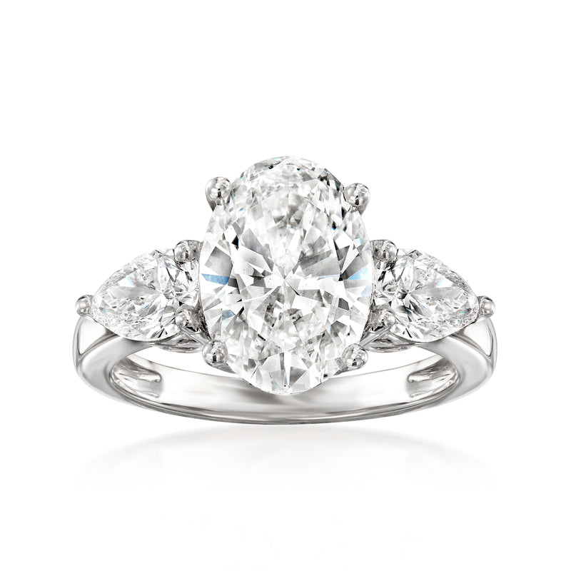 Lab-grown diamond ring in 14kt white gold with pear-shaped center stone and side diamonds