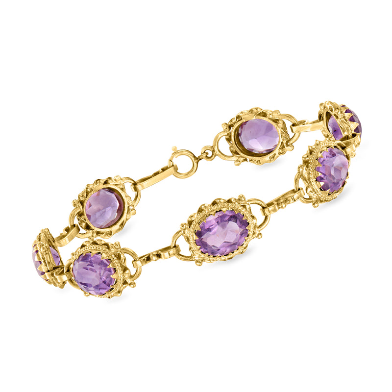 Vintage amethyst bracelet in 14kt yellow gold with oval purple gemstones, link setting.