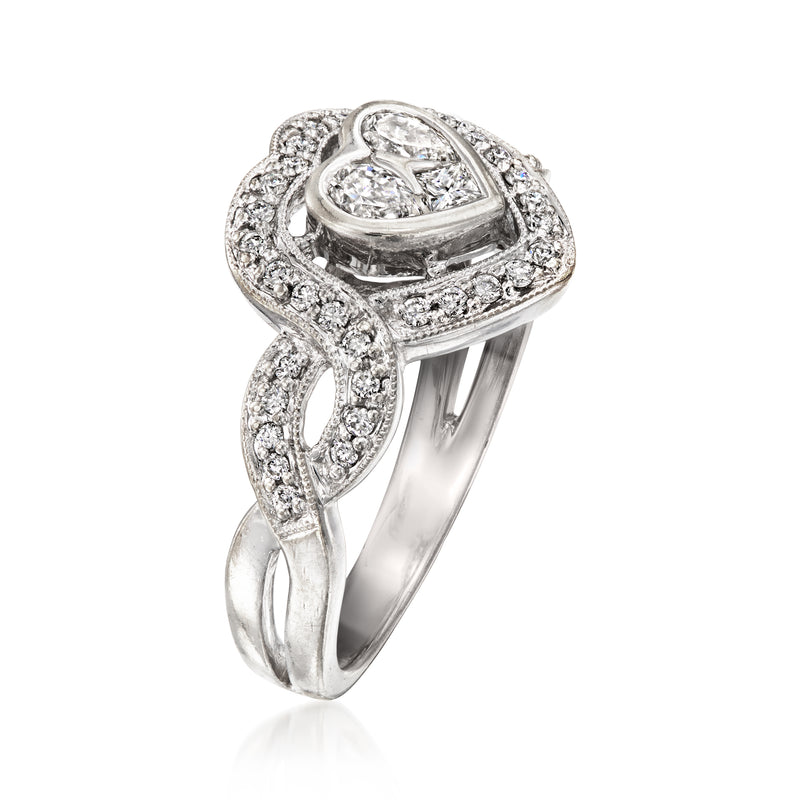 Vintage diamond heart ring in 14kt white gold with pavé twist band