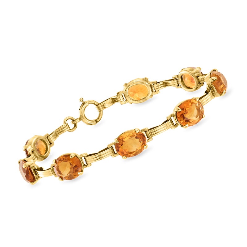 14kt yellow gold bracelet with oval and round citrine gemstones and hinged clasp