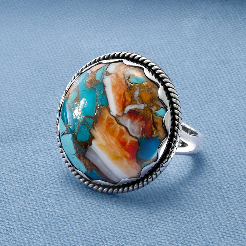 Round turquoise inlay sterling silver ring, oval stone with braided border