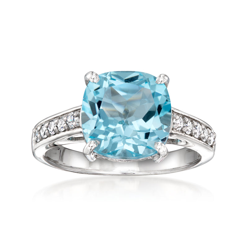 Sterling silver ring with large sky blue topaz center and lab-grown diamond side accents