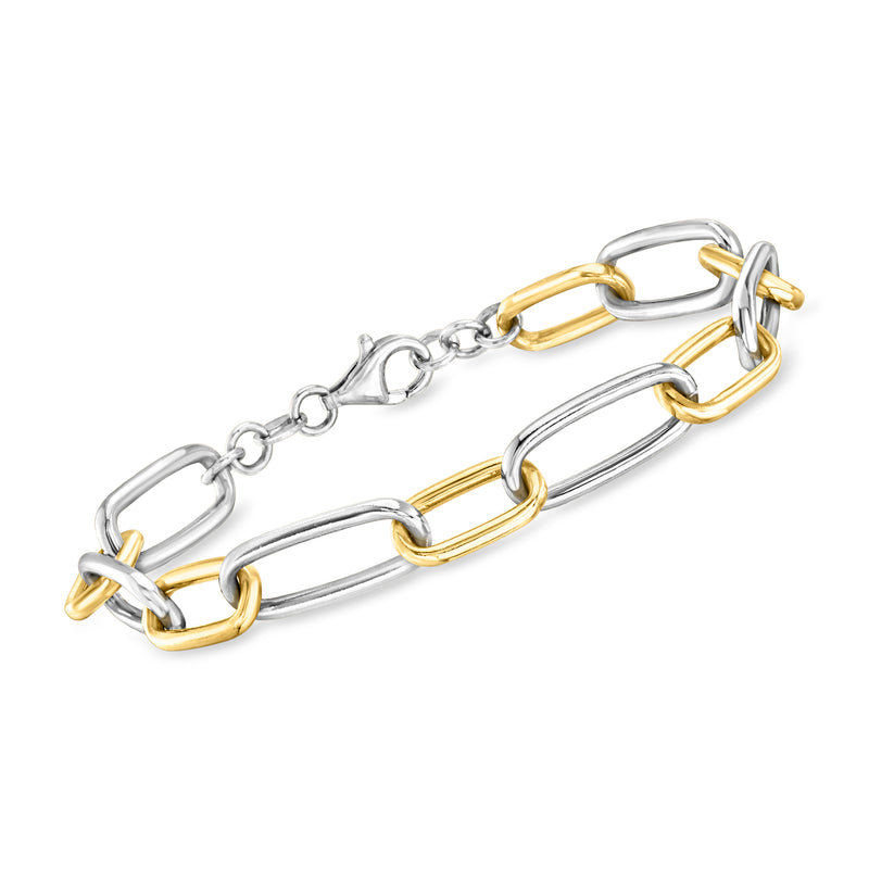Mixed metal paper-clip link bracelet with clasp; silver links and gold-tone accents