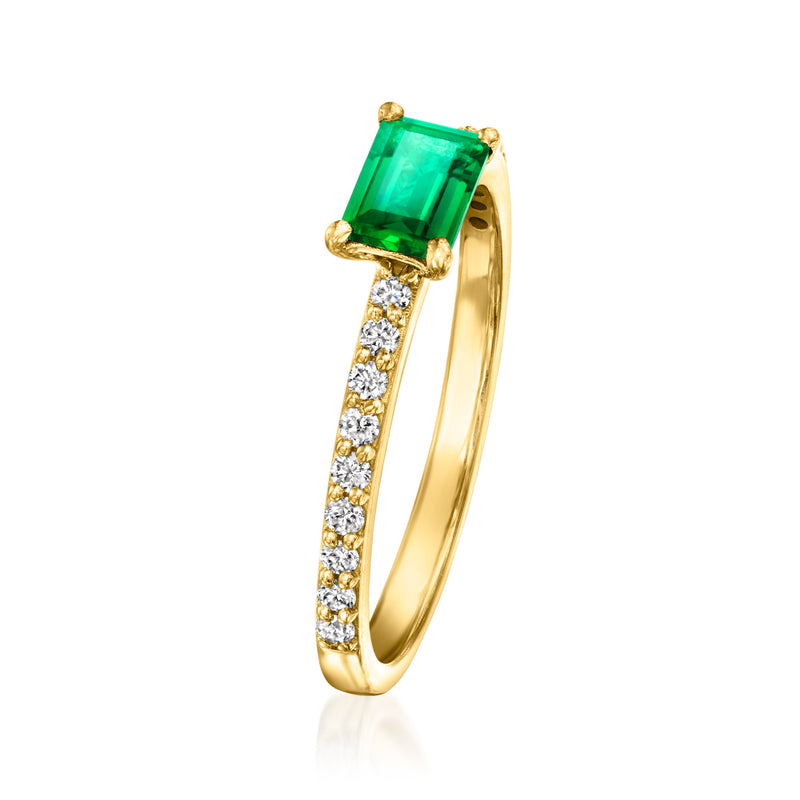 Gold vermeil ring side view with green emerald square center and diamond pave band