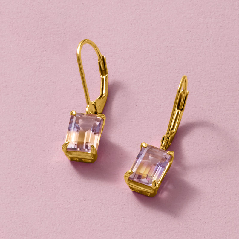 Gold leverback drop earrings with rectangular purple-yellow ametrine stones.