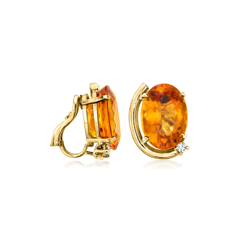 Gold clip-on earrings with oval citrine and white diamond accents, side view