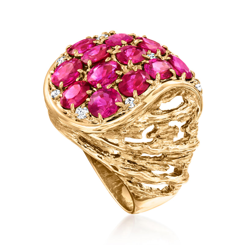18kt yellow gold ruby and diamond ring, angled view of sculpted shank and pink stones