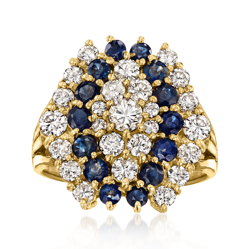 Yellow gold cluster ring with blue sapphire and diamond stones in a floral design