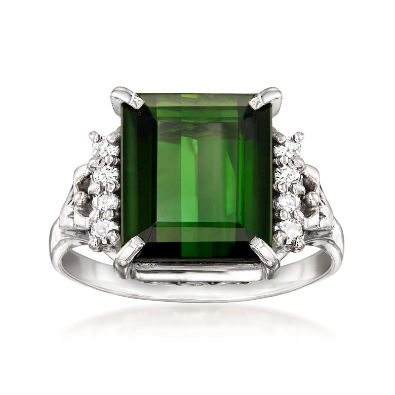 Vintage platinum ring with large emerald-cut green tourmaline and diamond side clusters
