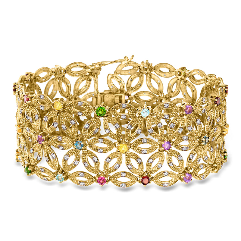 Gold-tone floral openwork bracelet with multicolor gemstones, hinged cuff