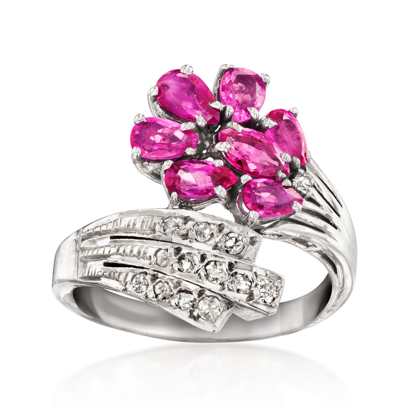Vintage bypass ring in white gold with pink oval rubies and diamond accents