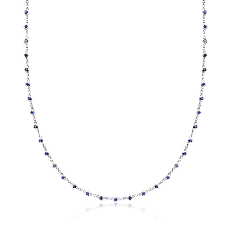 14kt white gold station necklace with round blue sapphire beads along chain