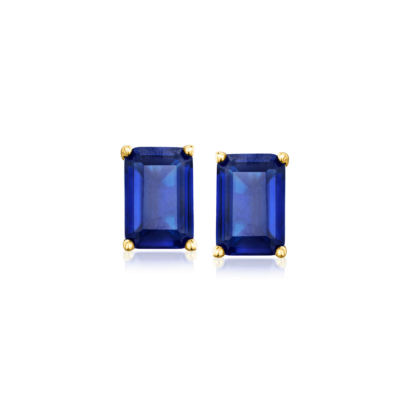 Emerald-cut blue sapphire stud earrings in gold-tone settings