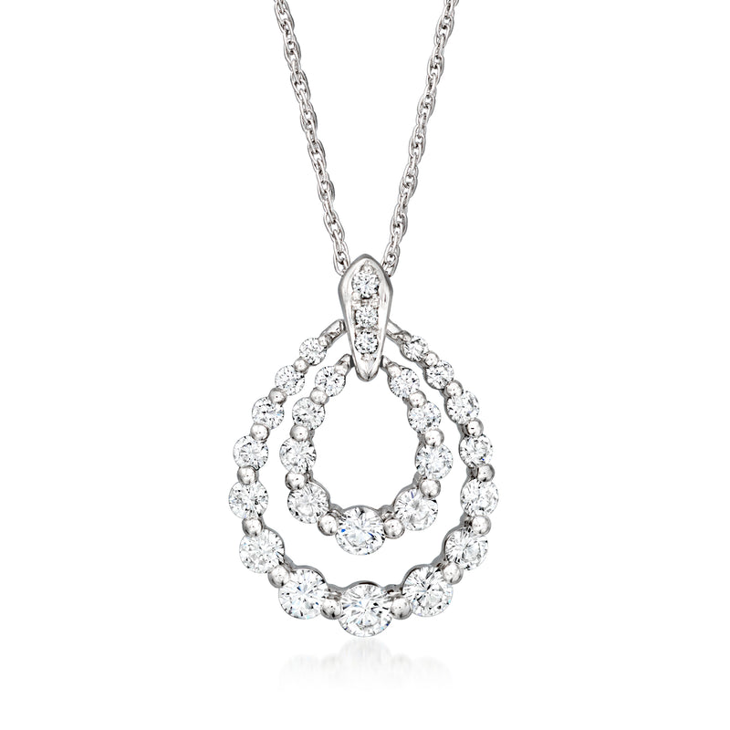 Platinum diamond pendant necklace with circular halo of round stones on cable chain