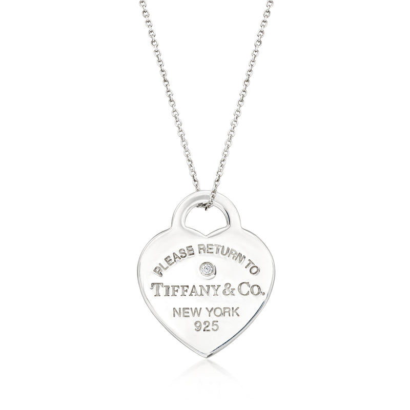 Sterling silver heart pendant necklace with single diamond and Tiffany & Co. hallmark