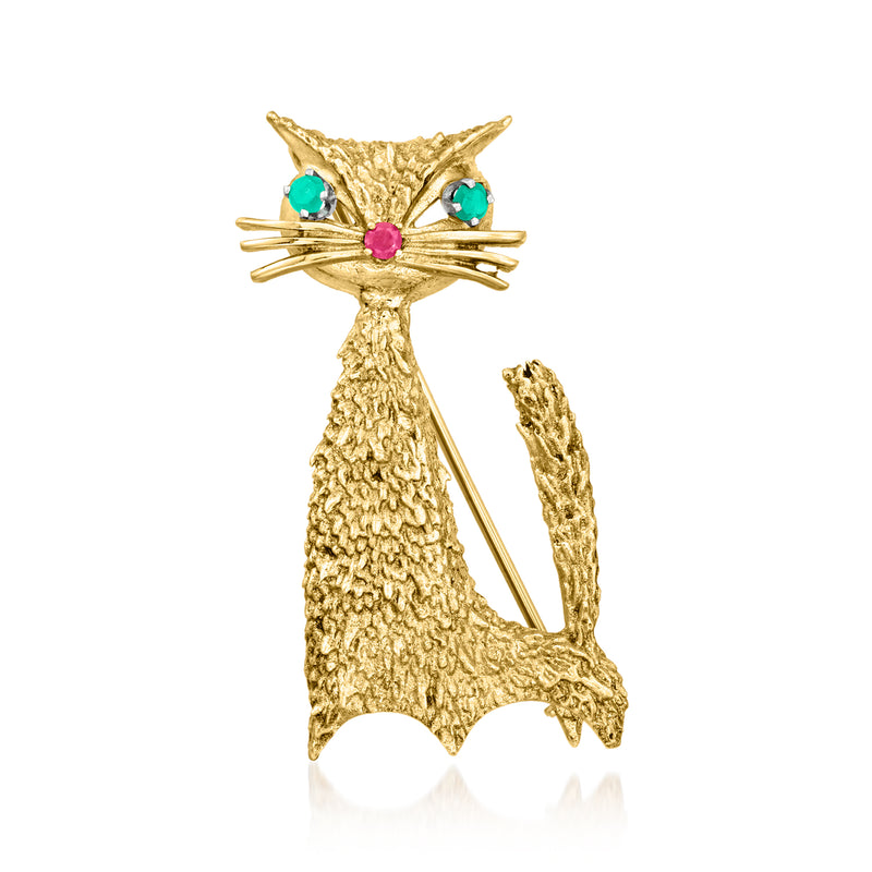 Cat pin in 14kt yellow gold with emerald-green and ruby gemstone eyes