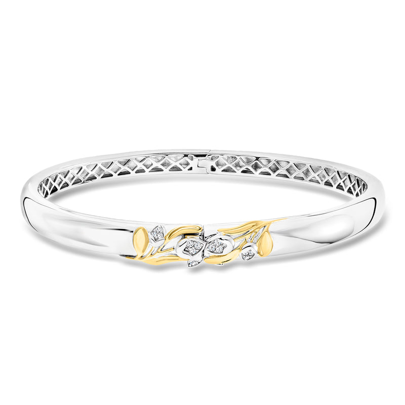 Sterling silver bangle with floral CZ stones and gold accents, openwork top
