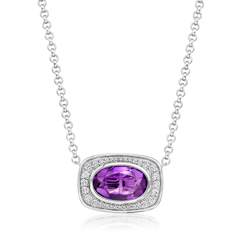 Sterling silver necklace with oval purple gemstone pendant and CZ halo on chain