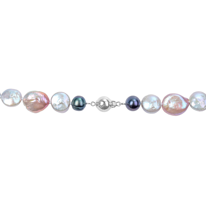 Cultured pearl necklace detail: sterling silver clasp with iridescent white and dark blue pearls