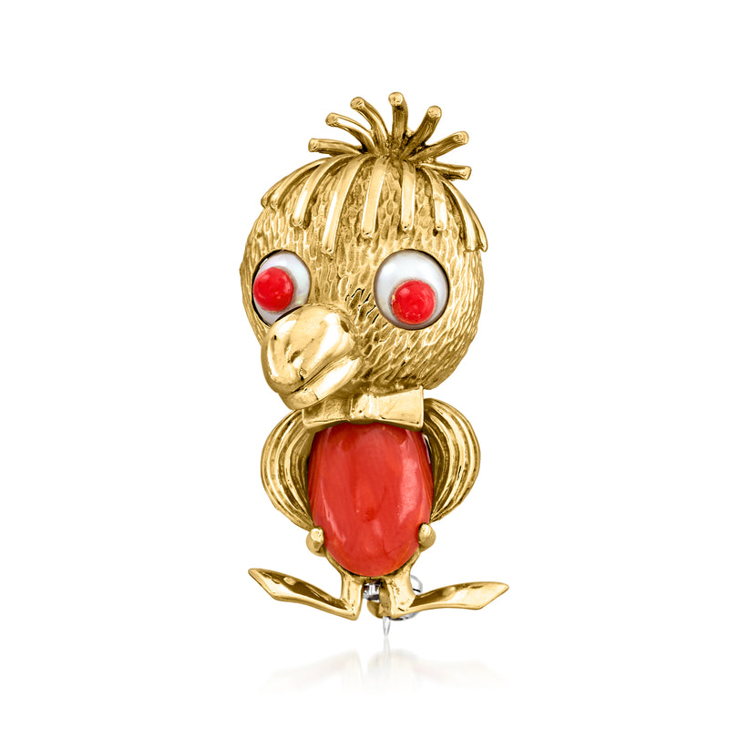 Gold bird pin with red coral cabochon eyes and oval coral body, vintage parrot style