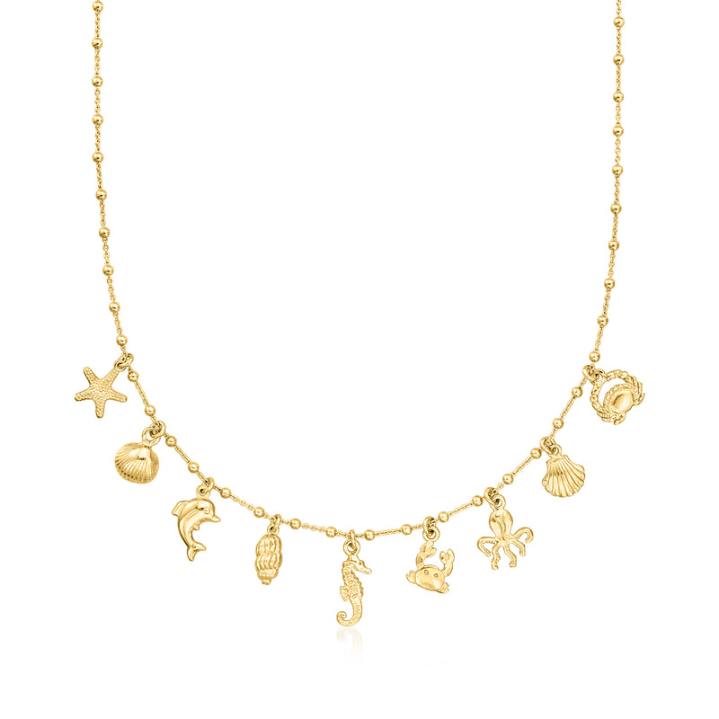 Gold sea life charm necklace with starfish, dolphin, seahorse, shell, octopus
