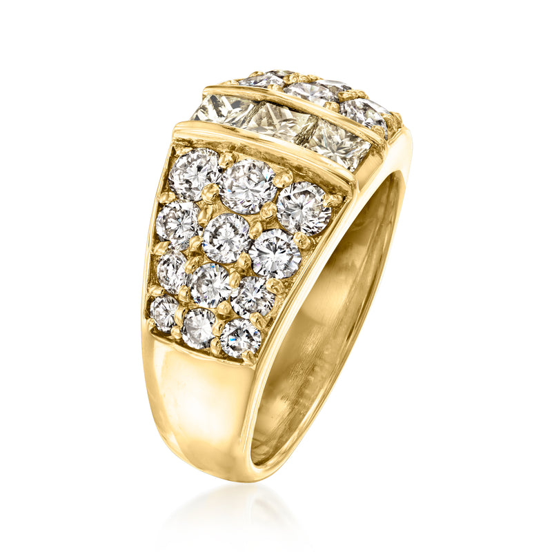 Angled view of vintage yellow gold three-row diamond ring with center channel
