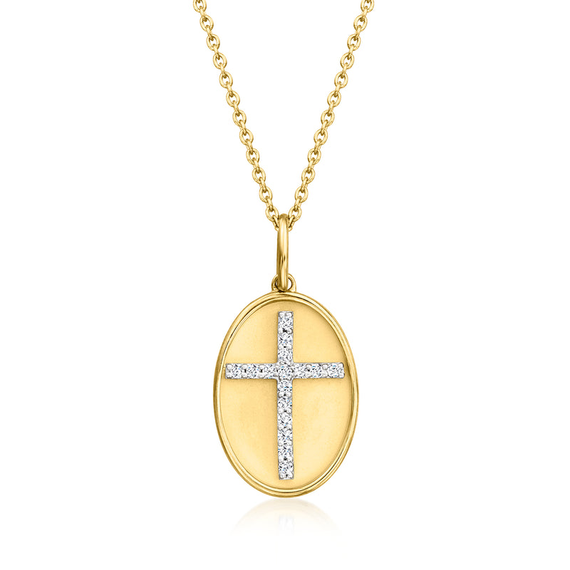 Gold oval pendant necklace with diamond cross on a link chain