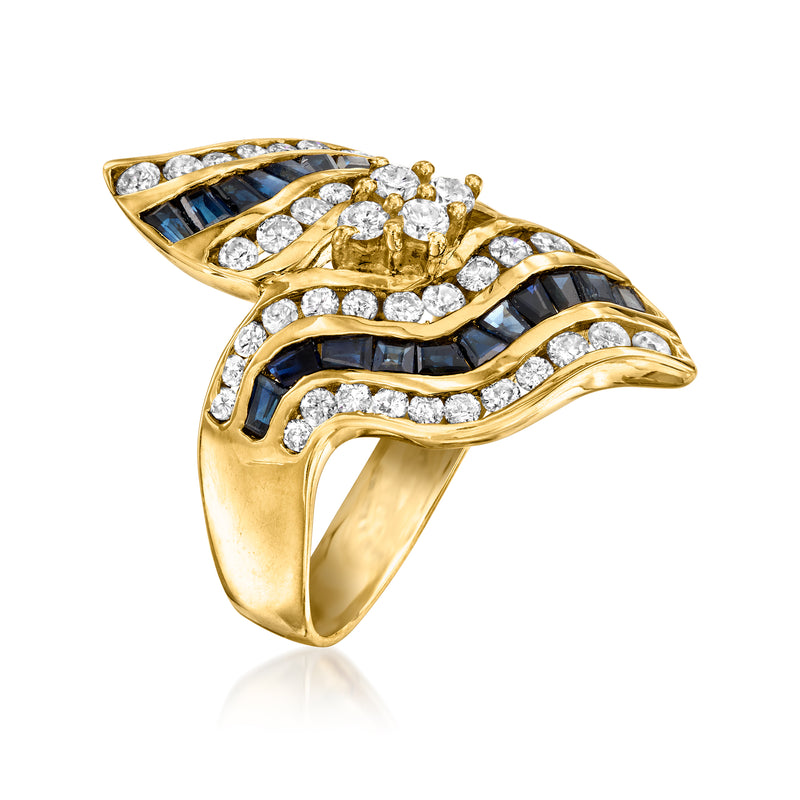 18kt yellow gold wave ring with dark blue sapphire inlay and round diamond details