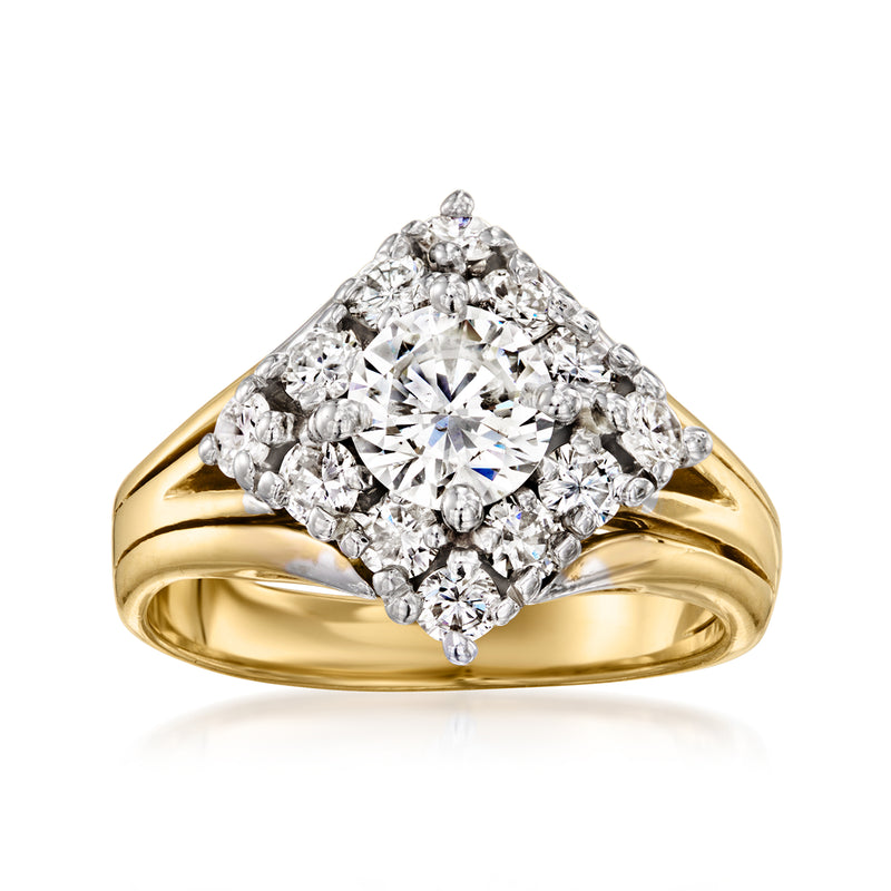Vintage diamond cluster ring in 14kt yellow gold with round brilliant center
