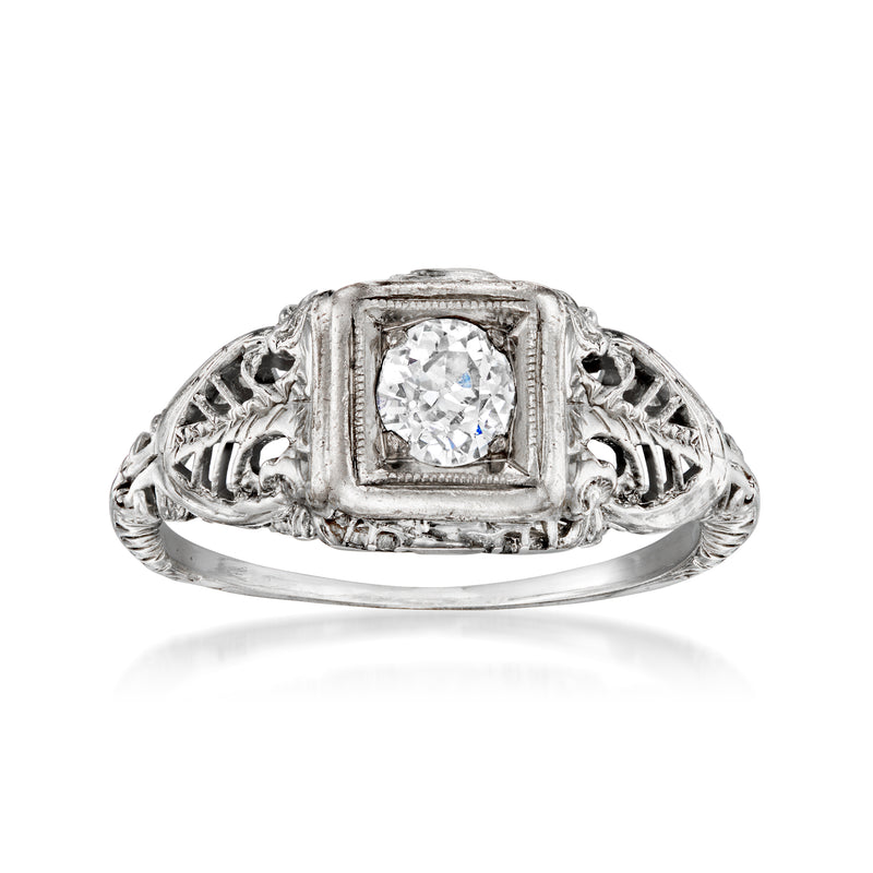 Vintage filigree diamond ring in 18k white gold with square-cut center stone