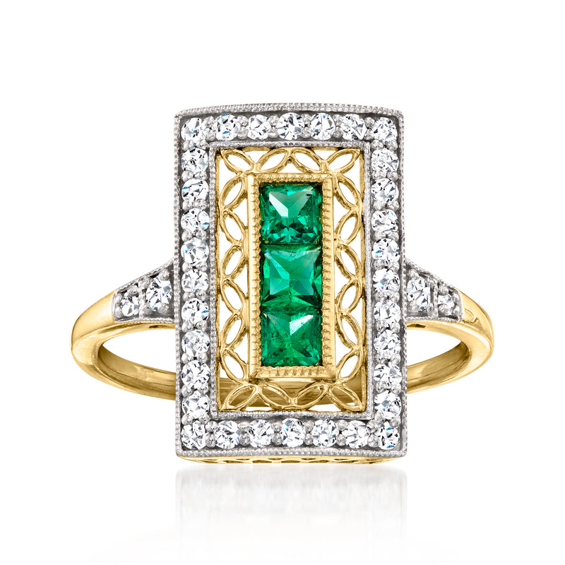 Yellow gold emerald ring with rectangular diamond halo and emerald cut green stone