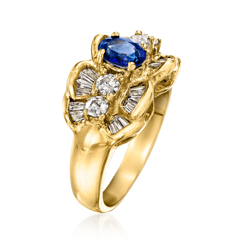 18k yellow gold ring with large oval blue sapphire and diamond clusters on sides
