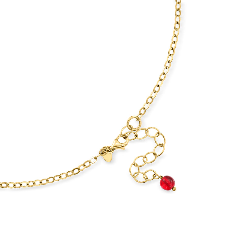 Gold-tone clasp and chain detail on multicolored Murano glass bead necklace with red bead charm