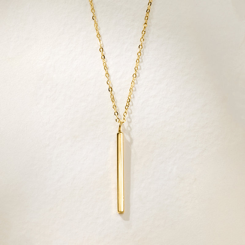 10kt yellow gold linear bar pendant necklace with cable chain, close-up