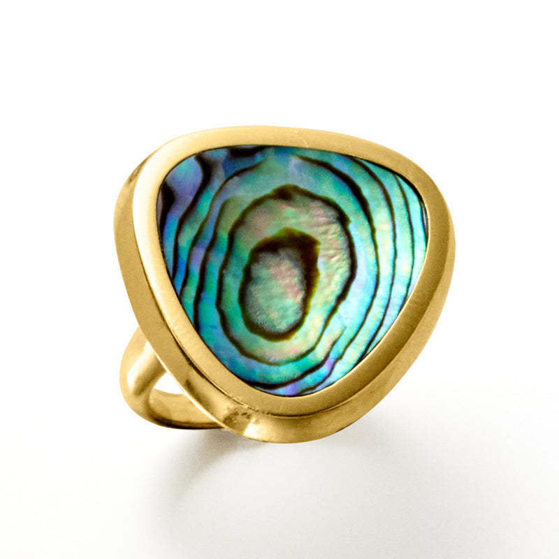 Triangular abalone shell ring with gold-tone frame and iridescent green-blue swirl