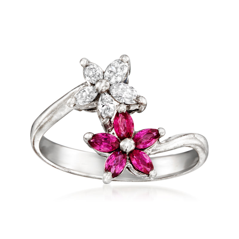 Platinum floral bypass ring with pink ruby center and white diamond petals, size 5