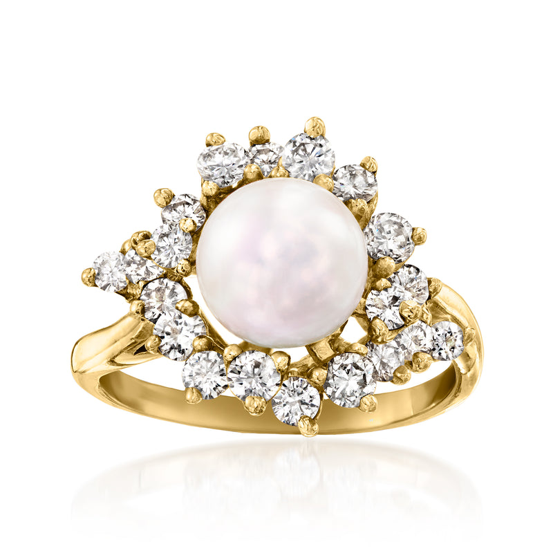 14kt yellow gold ring with round cultured pearl center and diamond cluster settings