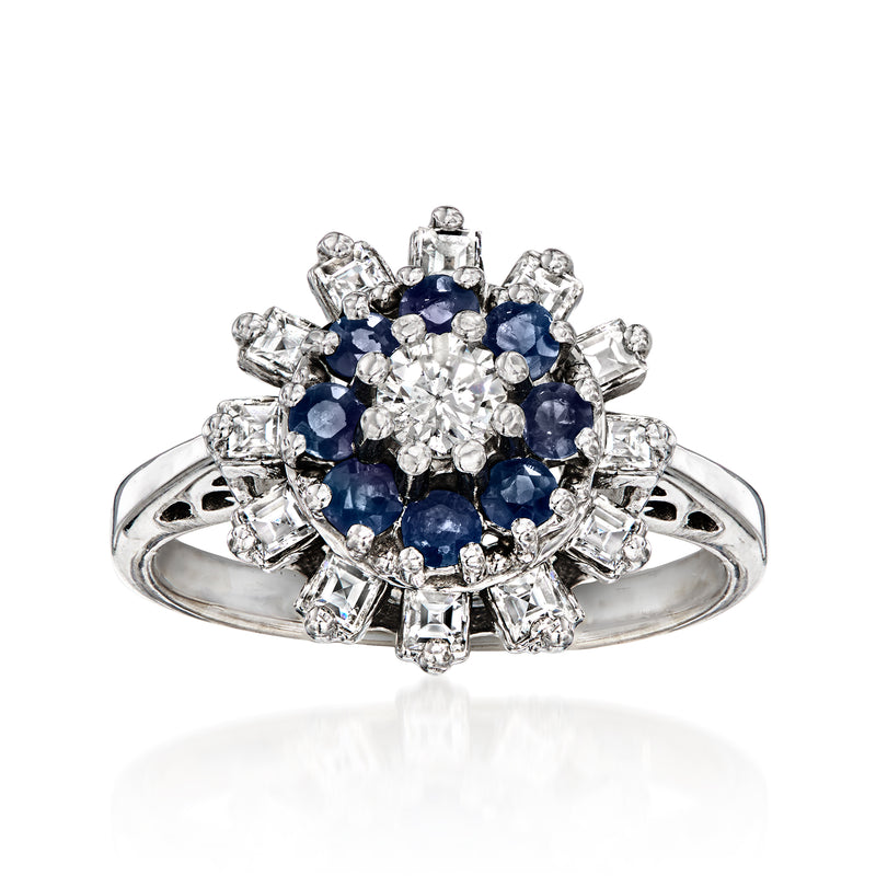 Vintage diamond and sapphire ring in 14kt white gold with blue center halo
