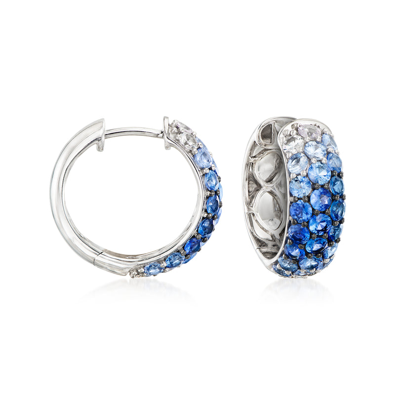 Hoop earrings with blue ombre stones and clear accents set in metal