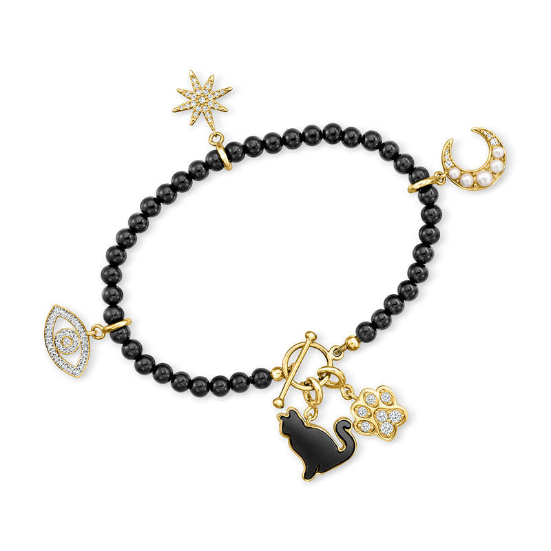 Black bead bracelet with gold toggle and star, moon, and heart charms on strand